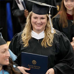 Tami Allen in graduate cap and gown